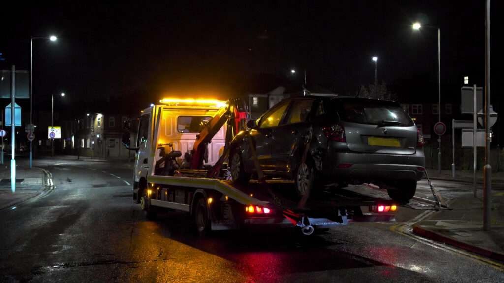 R&K Recovery 24-hour car recovery service in Coventry showing a recovery truck assisting a stranded vehicle on the roadside, providing fast and reliable assistance.